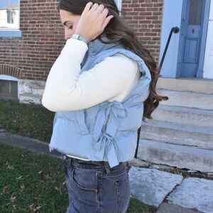 Aspen Baby Blue Puffer Vest With Bows. Large.